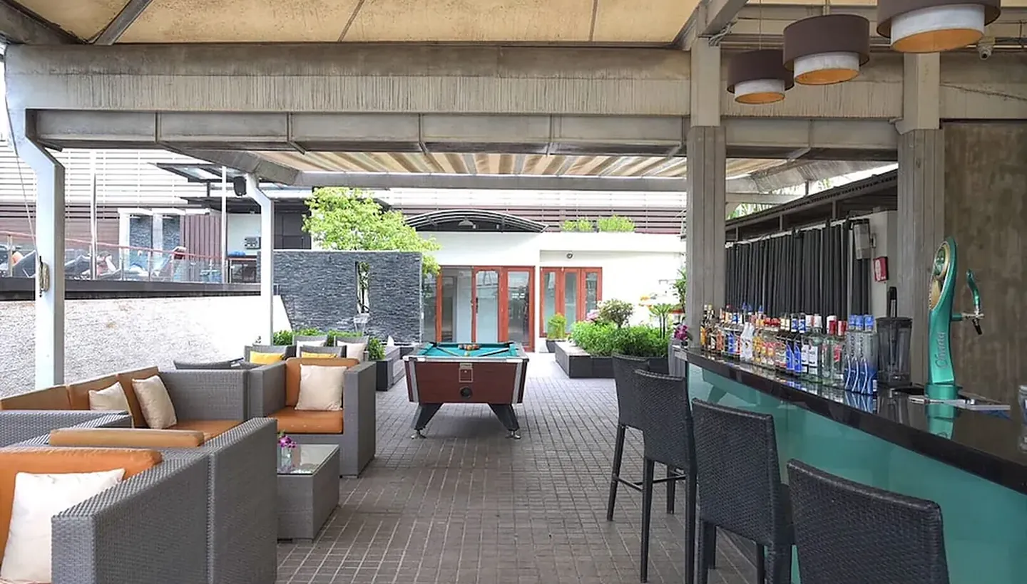 Poolside bar on the rooftop at Dang Derm Hotel